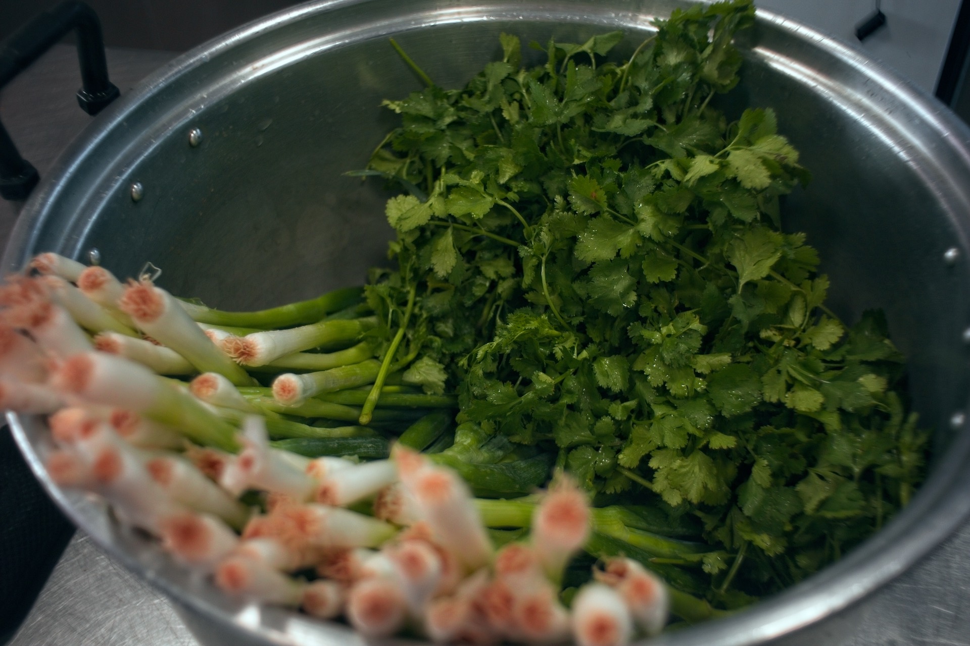 Close-up visual of aromatic ingredients. Aromatics bring lift and balance so the heat lands right.